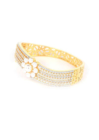 Gold Plated Wave Shaped Bracelet Adorned With Pearls And Stones Online - Kalki Fashion