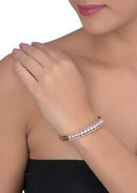 Gold Plated Bracelet Adorned With Pearls And Stones Online - Kalki Fashion