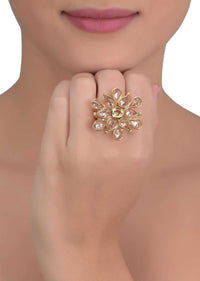 Gold plated floral pattern ring with tear drop and round pale wheat crystals only on Kalki