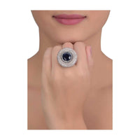 Gunmetal grey stone studded round ring with midnight blue crystal in the center only on Kalki