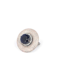 Gunmetal grey stone studded round ring with midnight blue crystal in the center only on Kalki