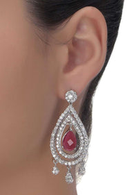 Magenta crystal danglers with stones in tear drop shape only on Kalki