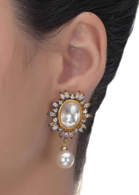 Oval Kundan And Crystal Gold Plated Studs With Dangling Pearl Online - Kalki Fashion