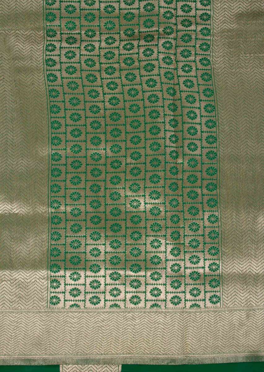 Parakeet green banarasi silk saree in floral pot weaved butti 