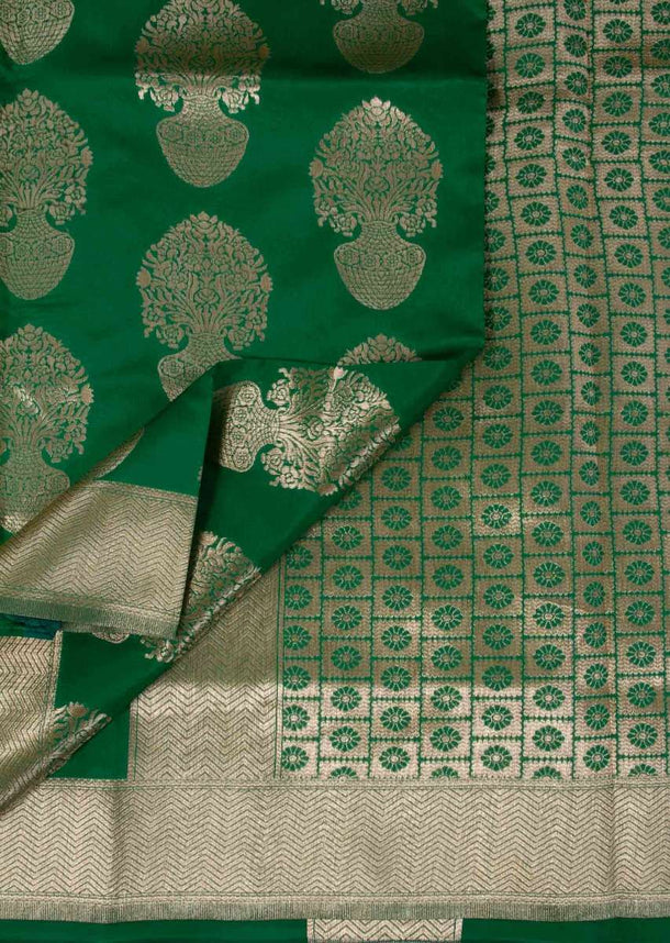 Parakeet green banarasi silk saree in floral pot weaved butti