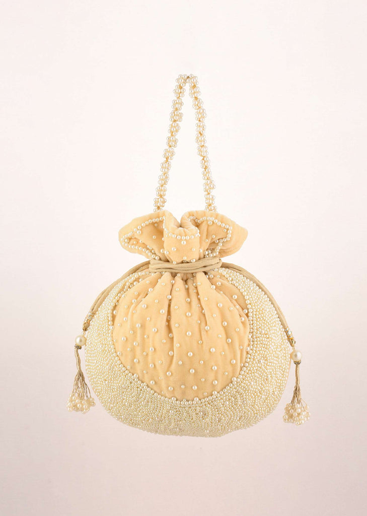 Parmesan Yellow Potli Bag In Velvet With Moti Work In Crescent Design Along The Edge And Scattered In The Centre By Shubham