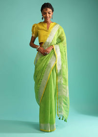 Parrot Green Saree In Linen With Silver Brocade Border And Striped Pallu Along With Yellow Unstitched Blouse