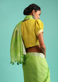 Parrot Green Saree In Linen With Silver Brocade Border And Striped Pallu Along With Yellow Unstitched Blouse