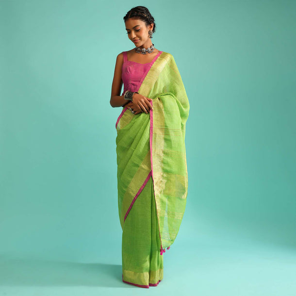 Parrot Saree In Linen With Golden Brocade Border And Striped Pallu Along With Magenta Unstitched Blouse