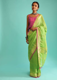 Parrot Saree In Linen With Golden Brocade Border And Striped Pallu Along With Magenta Unstitched Blouse