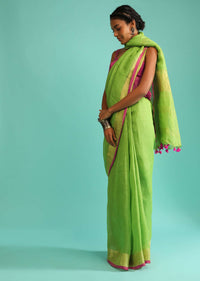 Parrot Saree In Linen With Golden Brocade Border And Striped Pallu Along With Magenta Unstitched Blouse