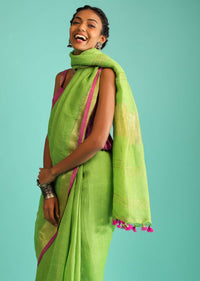 Parrot Saree In Linen With Golden Brocade Border And Striped Pallu Along With Magenta Unstitched Blouse