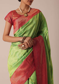 Parrot Green Brocade Silk Saree With Woven Detail And Unstitched Blouse Piece