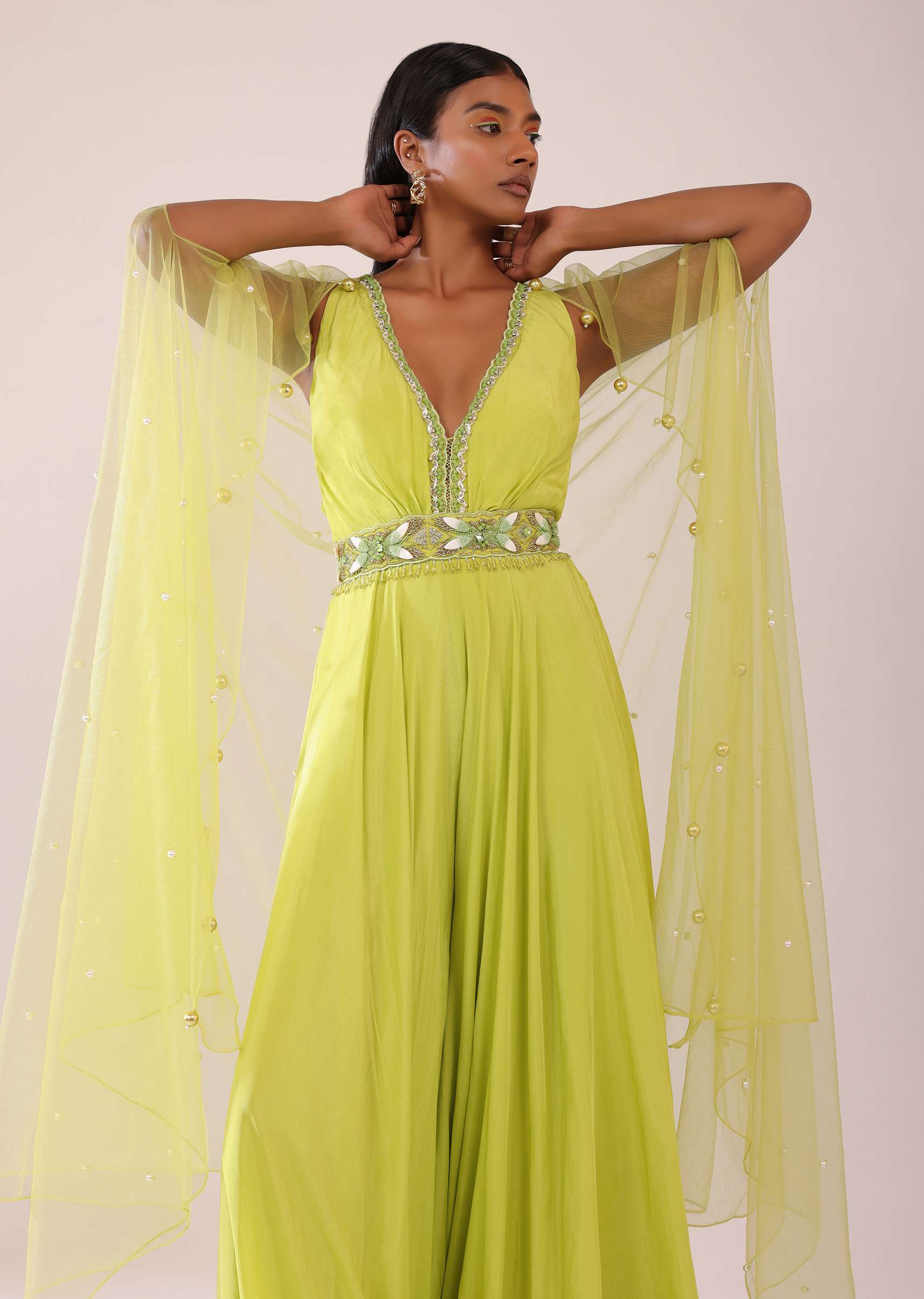 Sheen Green Crepe Jumpsuit And Net Shrug With A Crystal Bead Embroidered Belt