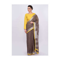 Pastel brown jute cotton saree with yellow border only on Kalki