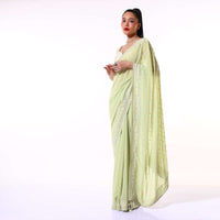 Pastel Green Saree In Georgette With Lucknowi Thread And Stone Embroidered Floral Border And Buttis Online - Kalki Fashion