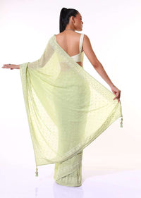 Pastel Green Saree In Georgette With Lucknowi Thread And Stone Embroidered Floral Border And Buttis Online - Kalki Fashion