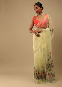 Pastel Yellow Saree In Organza With Floral Print On The Border And Pallu Along With Sequin Highlights Online - Kalki Fashion