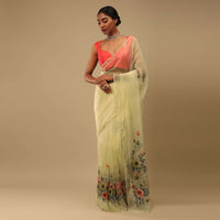 Pastel Yellow Saree In Organza With Floral Print On The Border And Pallu Along With Sequin Highlights Online - Kalki Fashion