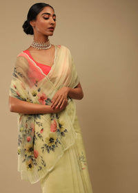 Pastel Yellow Saree In Organza With Floral Print On The Border And Pallu Along With Sequin Highlights Online - Kalki Fashion