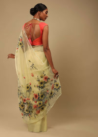 Pastel Yellow Saree In Organza With Floral Print On The Border And Pallu Along With Sequin Highlights Online - Kalki Fashion