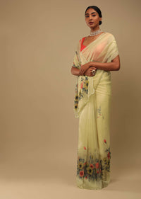 Pastel Yellow Saree In Organza With Floral Print On The Border And Pallu Along With Sequin Highlights Online - Kalki Fashion