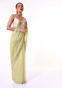 Pastel Yellow Saree In Organza With Mirror Embroidered Scallop Border Along With Cut Dana Accents Online - Kalki Fashion