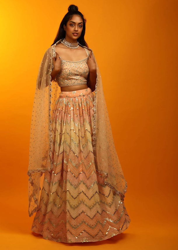 Pastel Peach And Yellow Lehenga In Georgette With Chevron And Bandhani Print And Mirror Embroidered Choli