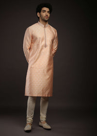 Pastel Peach Kurta Set In Brocade Silk With Woven Design All Over And Zari Work On The Placket