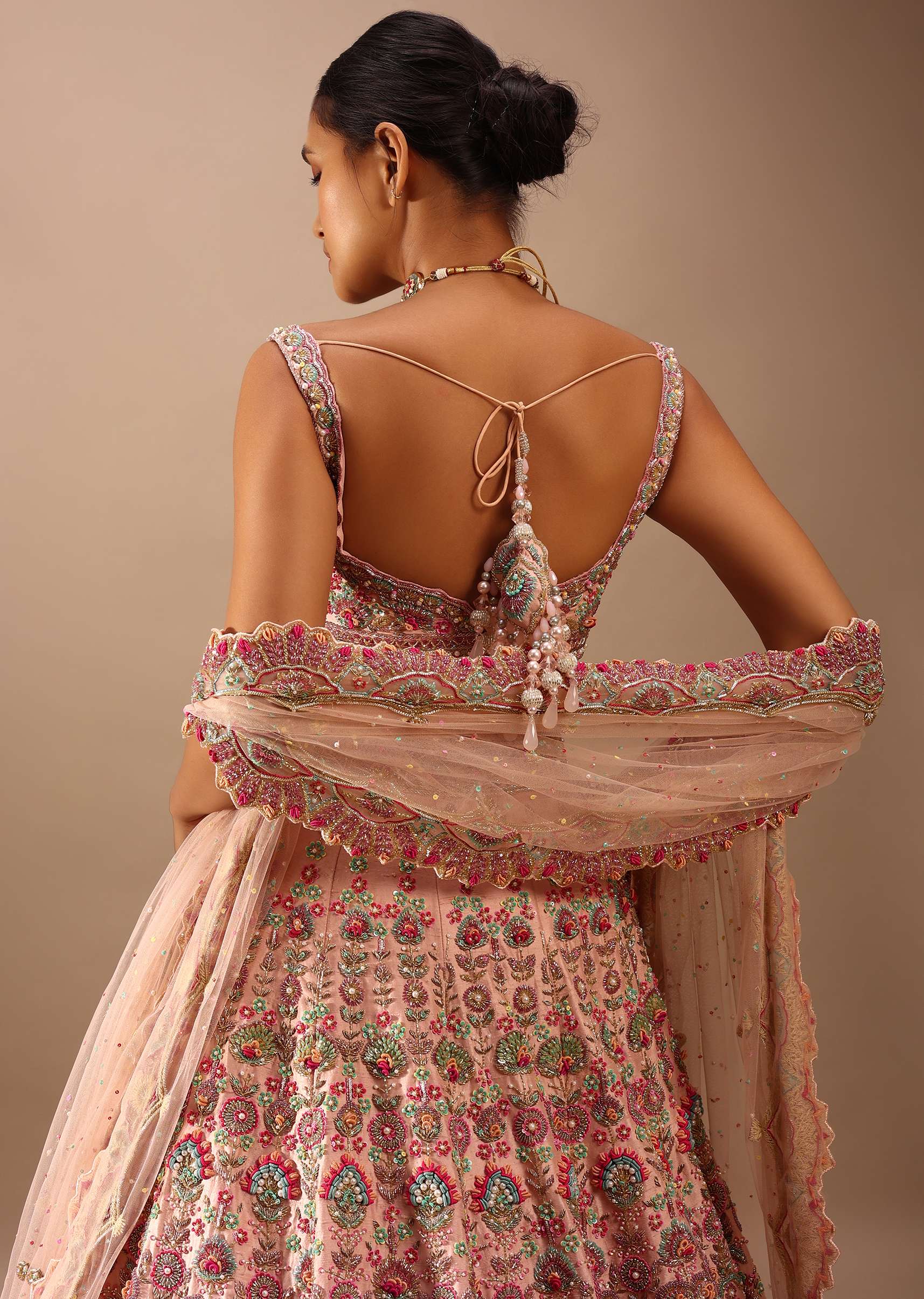 Pastel Pink Lehenga With A Crop Top In Multi-Colored Resham Embroidery, Crop Top Comes In Sleeveless With Scalloped Neckline