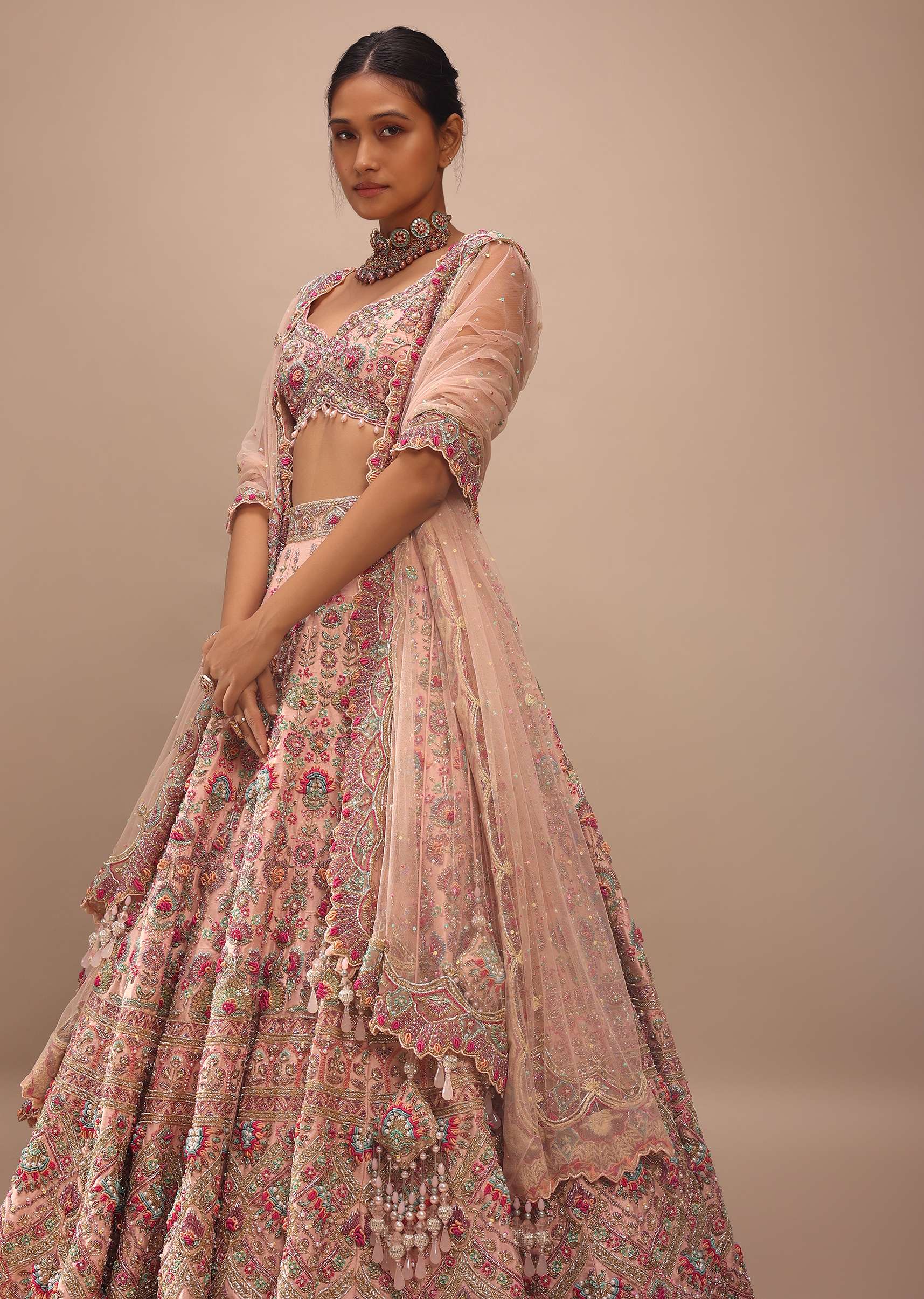 Pastel Pink Lehenga With A Crop Top In Multi-Colored Resham Embroidery, Crop Top Comes In Sleeveless With Scalloped Neckline