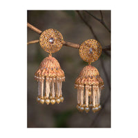 Peach And Gold Plated Jhumkas With Carved Design, Crystals And Dangling Pearl And Bead Fringes Online - Kalki Fashion