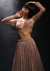 Peach And Silver Ombre Lehenga Embellished In Sequins And Hand Embroidered Choli With Plunging V Neckline