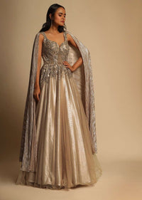 Peach Champagne Gown In Net With Zardosi And Sequins Embroidered Bodice And Shimmer Drape On Both Shoulders Online - Kalki Fashion