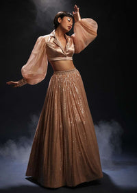 Peach Champagne Lehenga Embellished In Sequins And Velvet Crop Top Designed With Balloon Sleeves And Collar Neckline