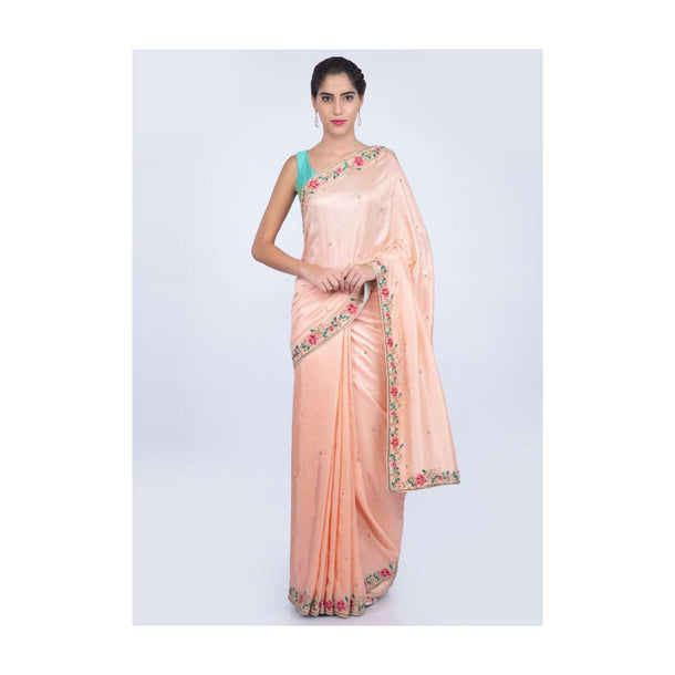 Peach dupion silk saree with embroidered butti and border only on kalki