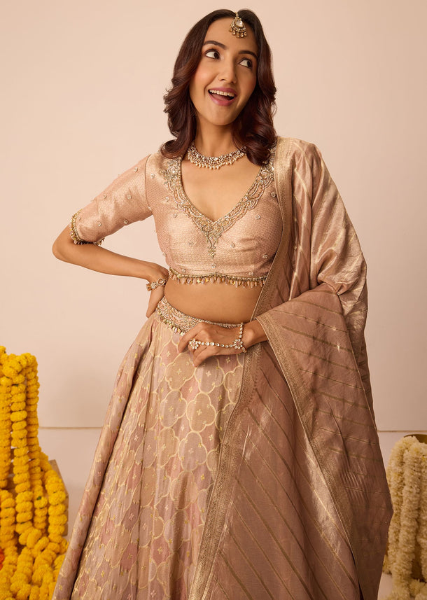 Peach Embroidered Blouse With Ruching Lehenga And Tassel Dupatta