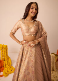 Peach Embroidered Blouse With Ruching Lehenga And Tassel Dupatta