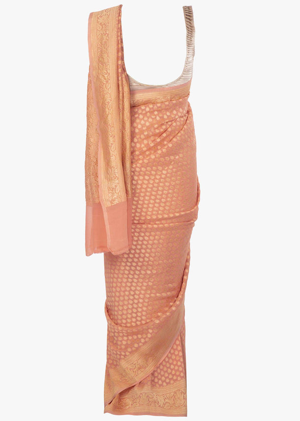 Peach georgette saree in weaved butti