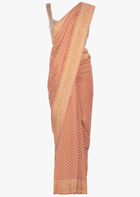 Peach georgette saree in weaved butti