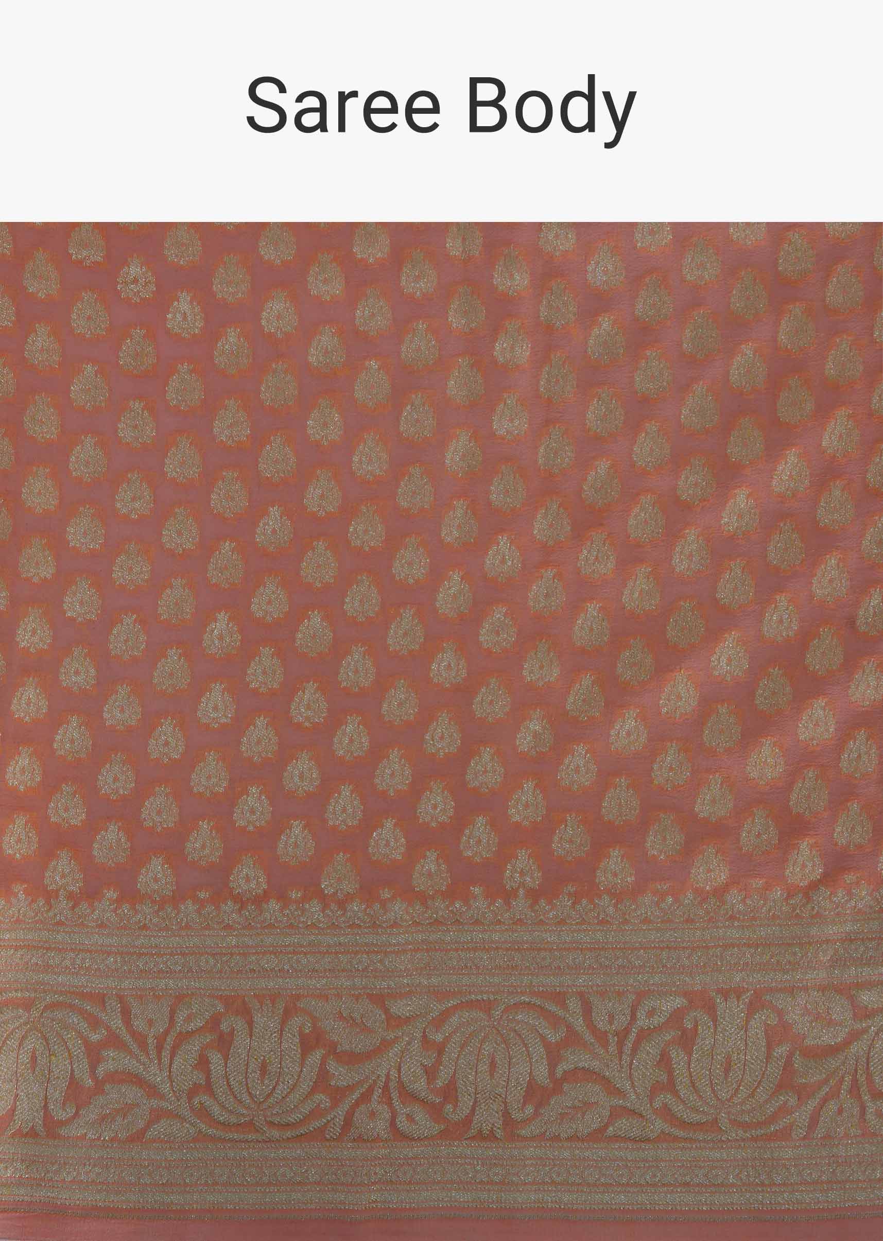 Peach georgette saree in weaved butti