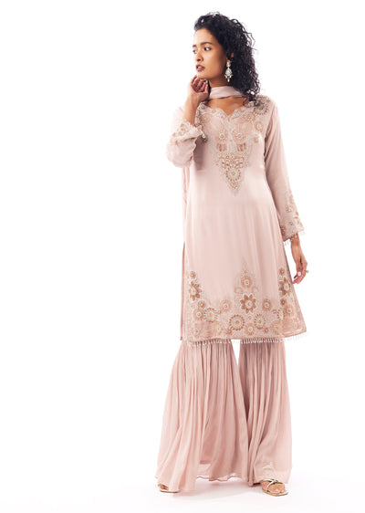 Peach Pakistani Style Sharara Suit With Cutdana Moti Shimmer