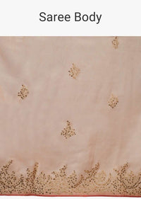 Peach raw silk saree in zari and sequins embroidered butti and border 