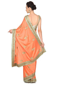 Peach saree adorn in sequin and kundan embroidery only on Kalki