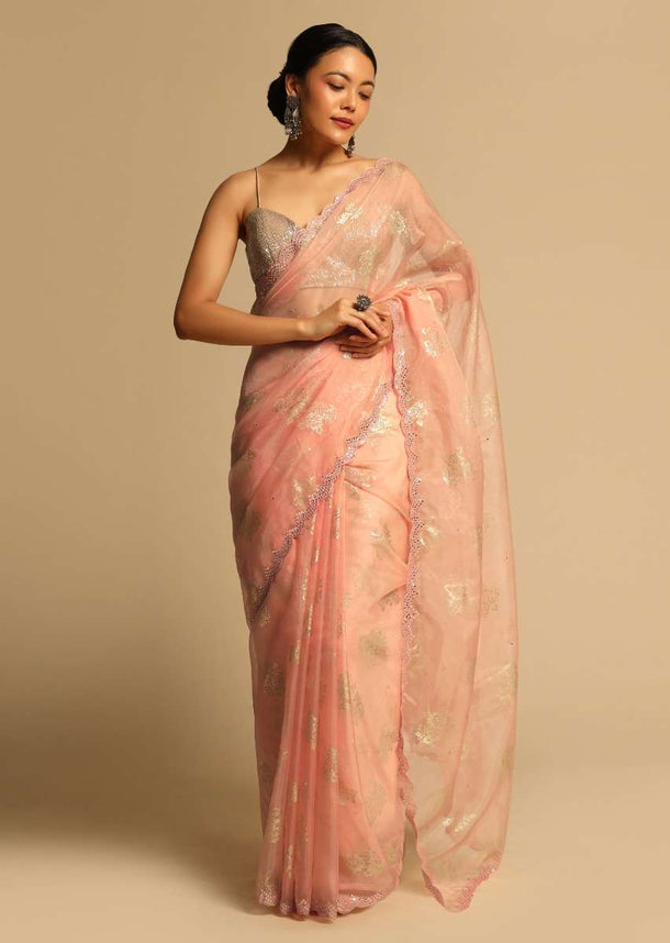 Peach Saree In Organza With Foil Printed Floral Buttis And Scalloped Mirror Border Along With Unstitched Blouse Online - Kalki Fashion