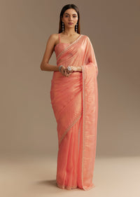 Peach Tissue Saree With Stones Cutdana Embellishments And Scallop Border