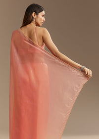 Peach Tissue Saree With Stones Cutdana Embellishments And Scallop Border