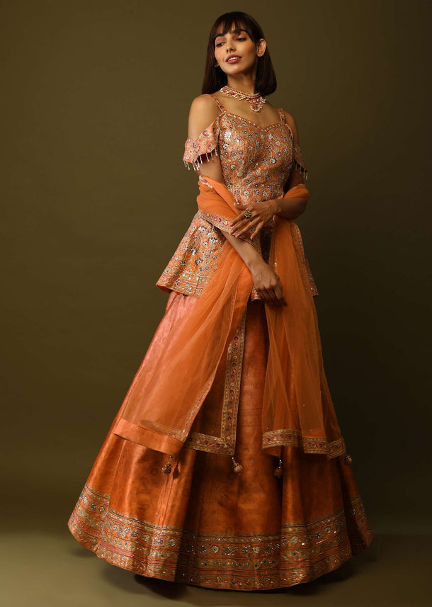 Peach And Orange Shaded Lehenga And Peplum Top With Floral Print, Mirror Work And Cold Shoulder Sleeves Online - Kalki Fashion