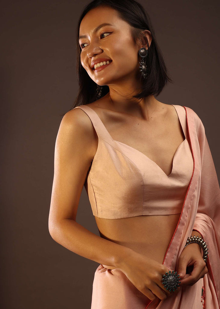 Peach Blush Sleeveless Blouse In A Sweetheart Neckline Back Hook Closure With A Straight Hemline