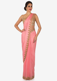Peach georgette saree with unstitched blouse adorn in heavy cut dana work only on Kalki